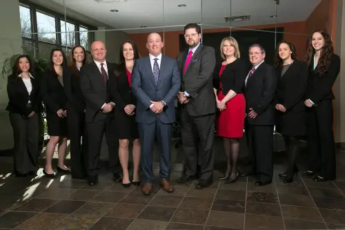 Meyer Wilson Werning staff pose in office