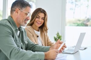 Married couple reviewing a variable universal life policy together.