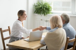 Attorney meets with clients who lost life savings due to investment fraud.