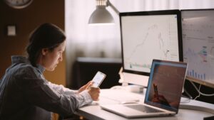 Woman studying charts as she tries to determine if futures are risky investments