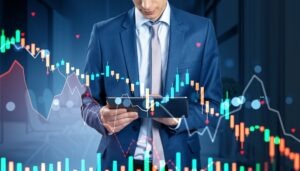 Person holding a tablet with a digital falling stock chart in front of them and looking for information about The Vanguard Group, Inc.