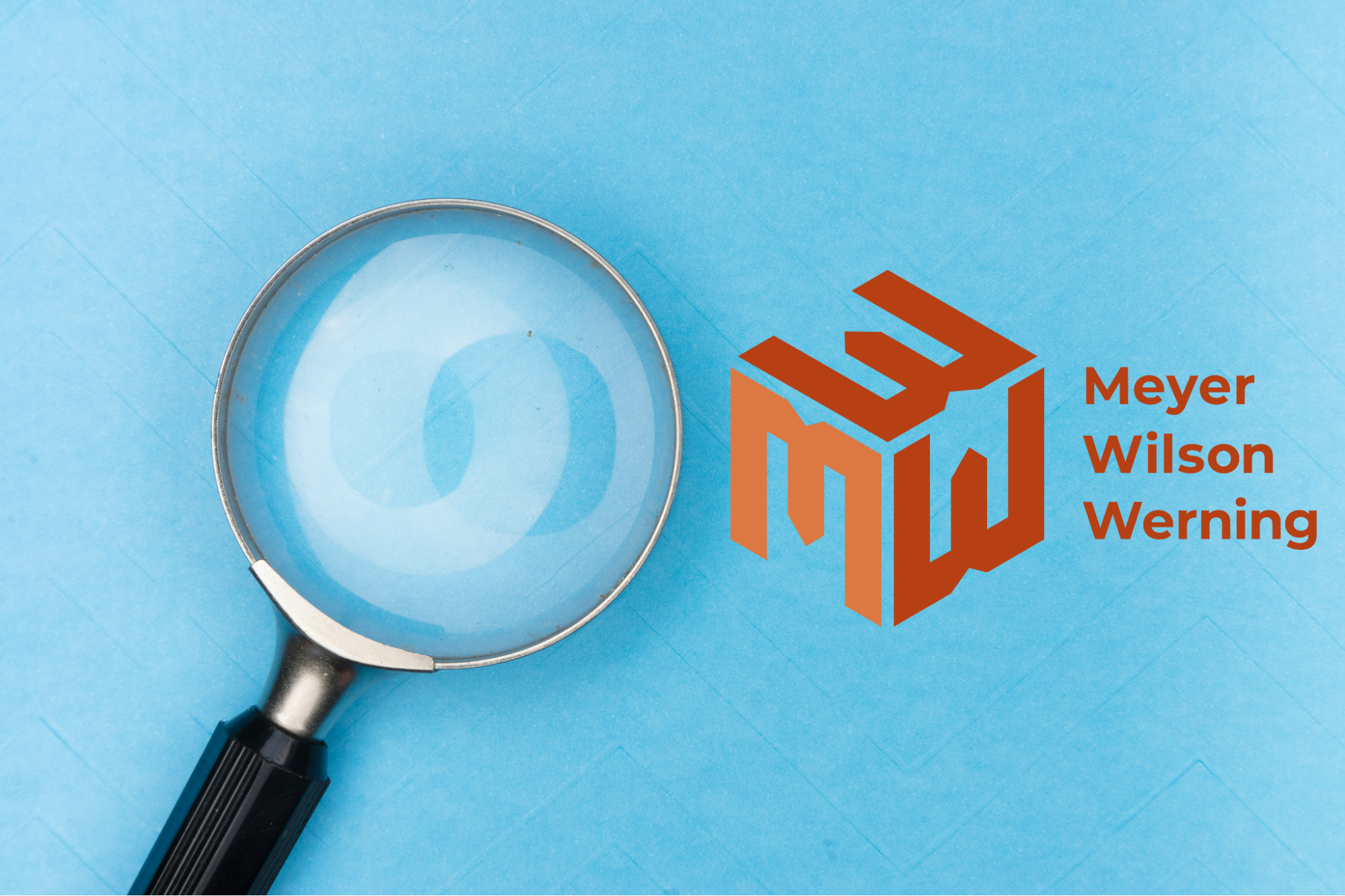 Magnifying glass next to the Meyer Wilson Werning logo on a light blue background